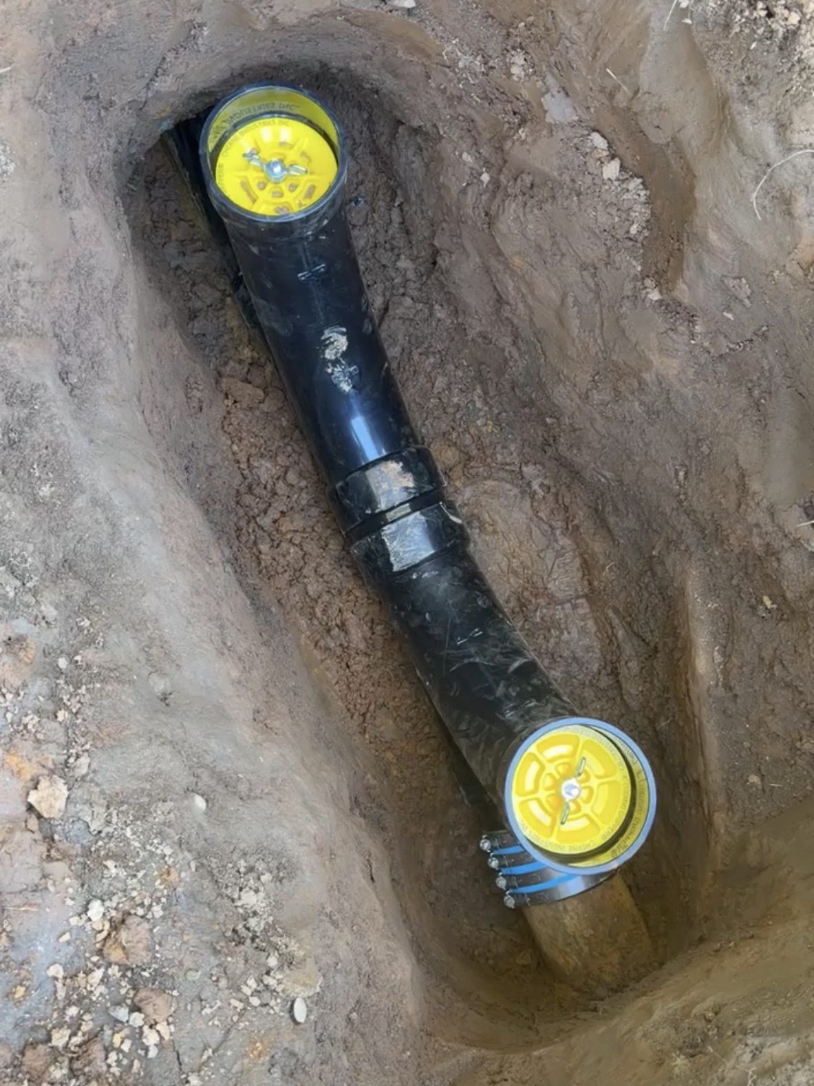 Carmichael sewer line replacement, new line in the trench